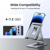 A close up of a cell phone on a stand with a phone in the background