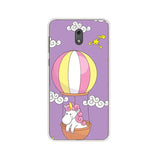 a cute unicorn in a hot air balloon with clouds and stars on a purple background