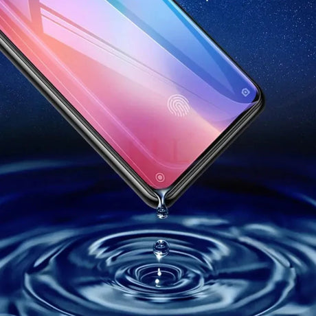 an image of a smartphone with water splashing on it