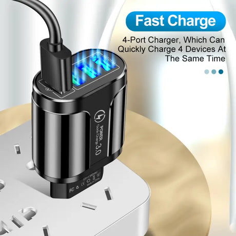 a close up of a charging device with a blue light on it