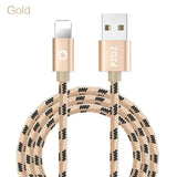 a cable with a gold colored braid