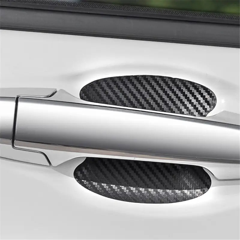 a close up of the carbon carbon door handle