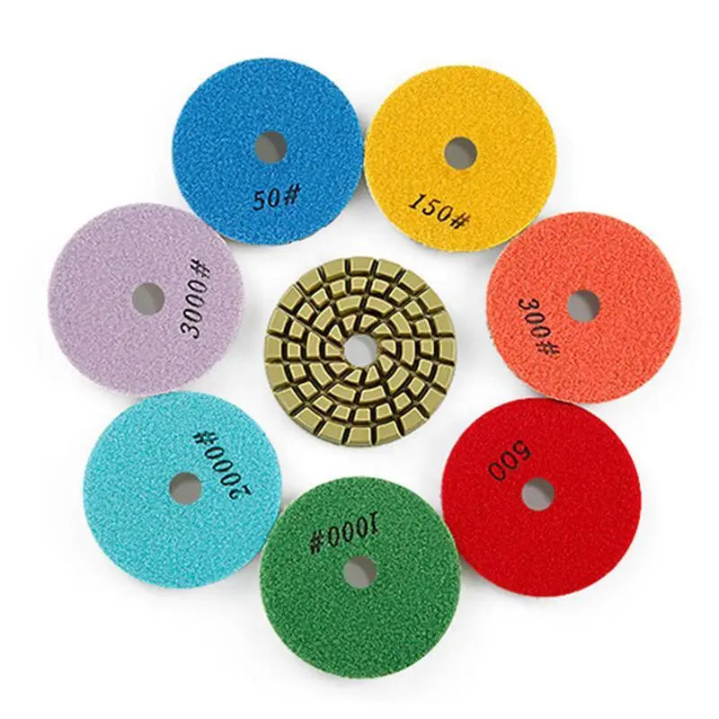a close up of a circular of colored polishing pads