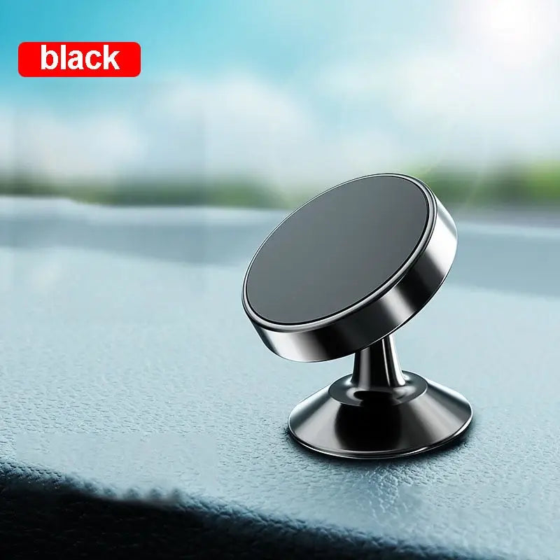 a close up of a car dashboard with a black phone holder