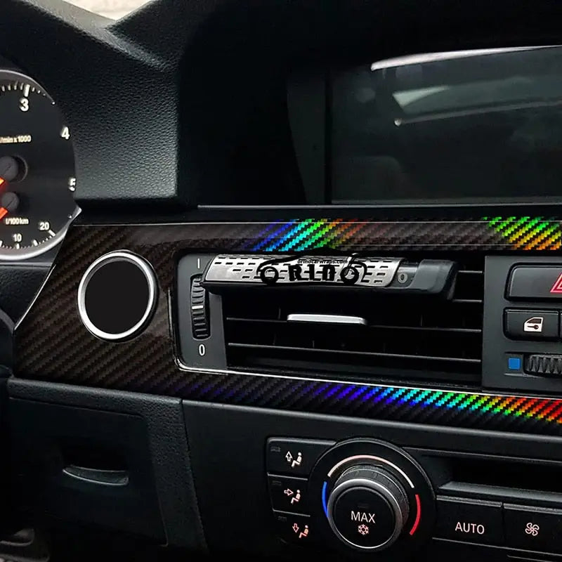 a close up of a car dashboard with a clock and a dash board