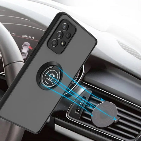 a close up of a car dashboard with a phone in the center