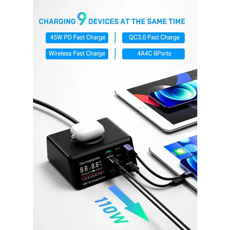 A close up of a charging device with a mouse and a cell phone