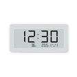 A close up of a digital clock with a white background