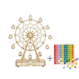 a close up of a ferris wheel with a box of candy