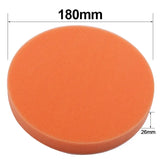 a round orange sponge with a white background