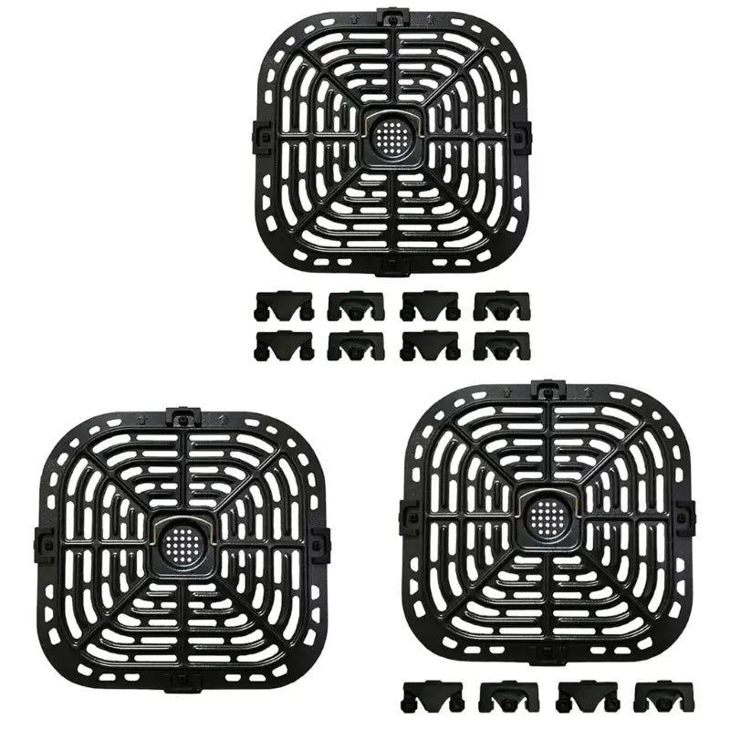 A close up of four black plastic square fan blades