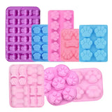 a close up of four different shaped ice trays with different shapes