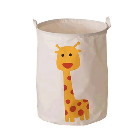 a close up of a giraffe design on a white laundry basket