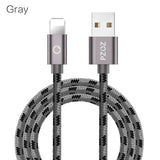 a close up of a gray and black cable with a white background