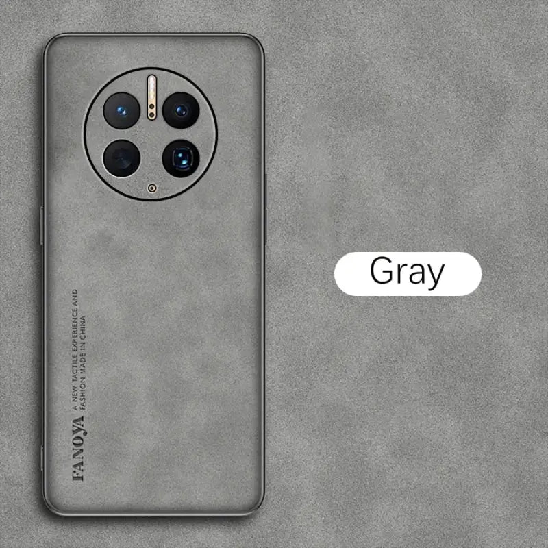 a close up of a gray phone with a gray background