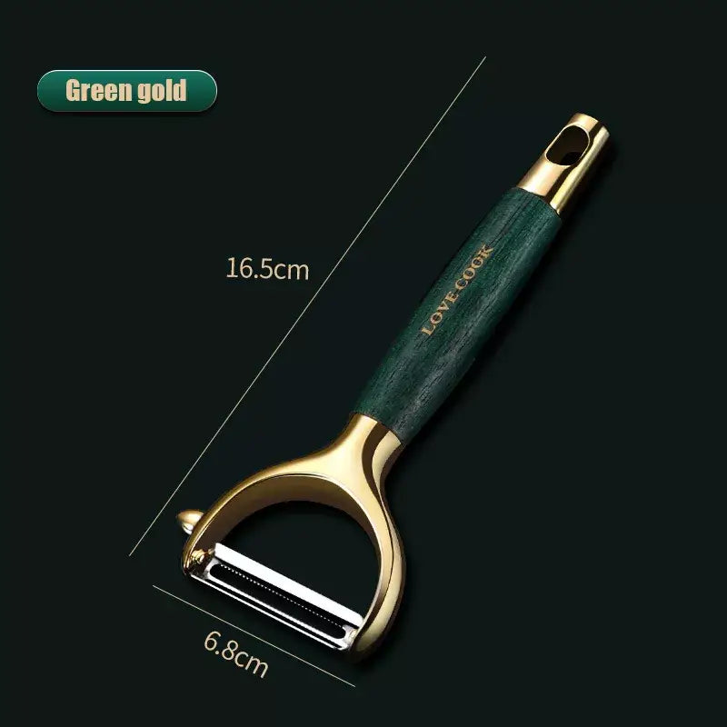 a close up of a green and gold razor on a black background