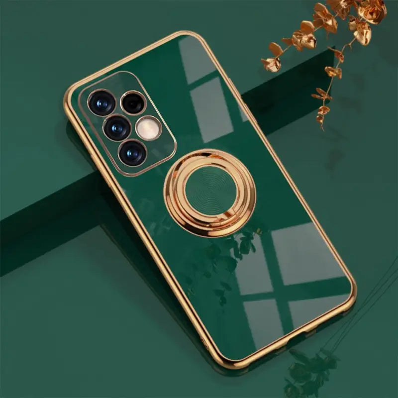 a green phone case with a gold ring