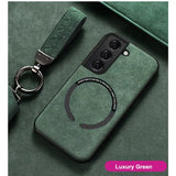 a close up of a green phone case with a keychain