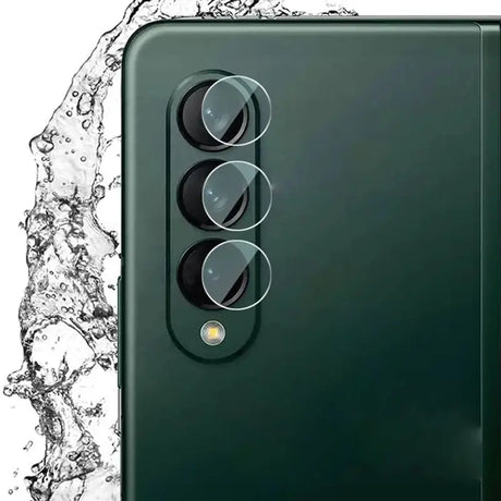 a close up of a green phone with a water splash