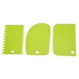 a close up of a green plastic cutting board with a knife