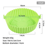 a close up of a green plastic cupcake pan with measurements