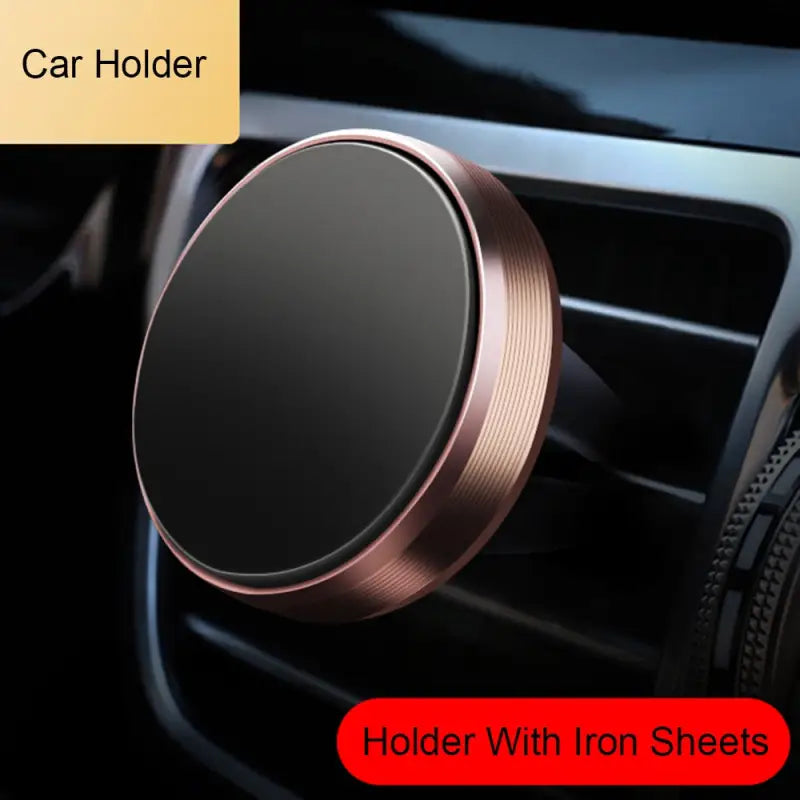 a close up of a car holder with a phone in it