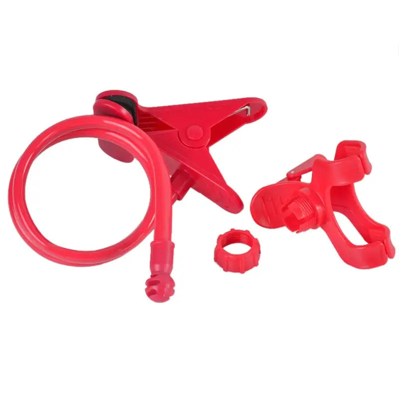 a close up of a red hose clamp with a couple of hoses