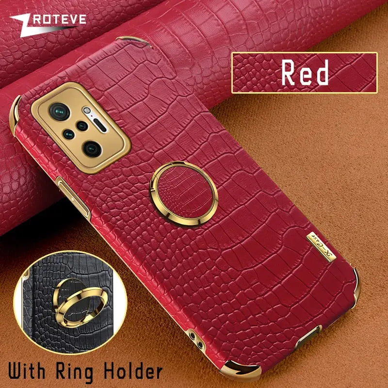 a close up of a red leather case with a gold ring holder