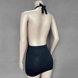 a close up of a mannequin wearing a black swimsuit