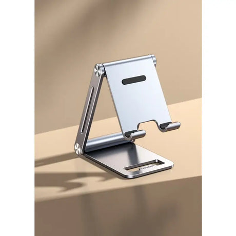 A close up of a metal device stand on a table