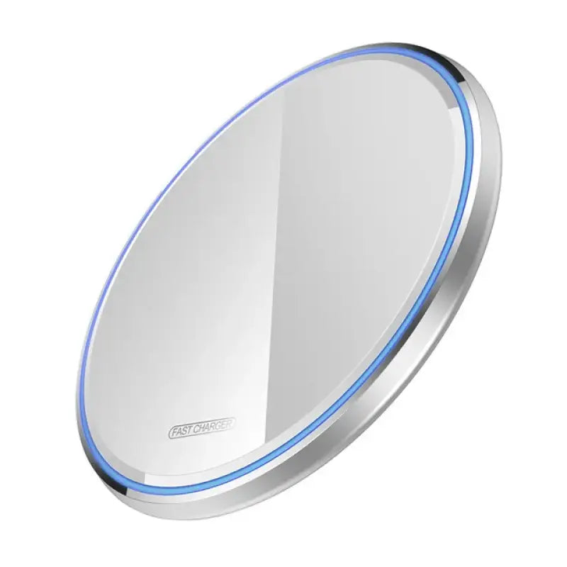 A close up of a mirror with a blue light on it