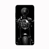 a close up of a motorcycle on a black background with a white background