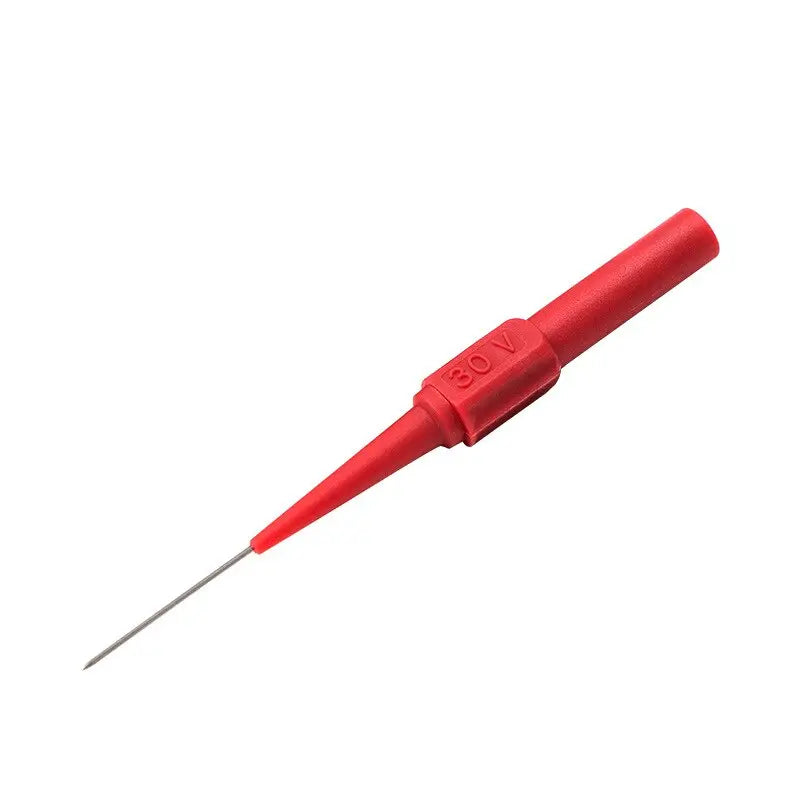 a close up of a red plastic tip with a needle