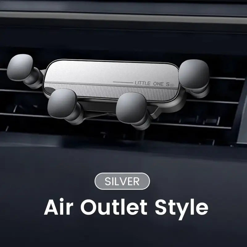 a close up of a car air outlet with a silver air outlet style