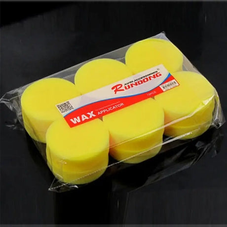 a close up of a package of wax sponges on a table
