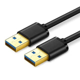 a close up of a pair of black and gold colored usb cables