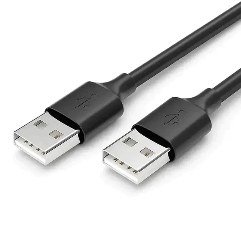 a close up of a pair of black usb cables connected to a computer