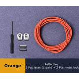 a close up of a pair of orange wires and a pair of metal locks