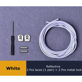 a close up of a pair of white wires and a pair of metal hooks