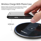 a hand holding a wireless phone with a wireless button