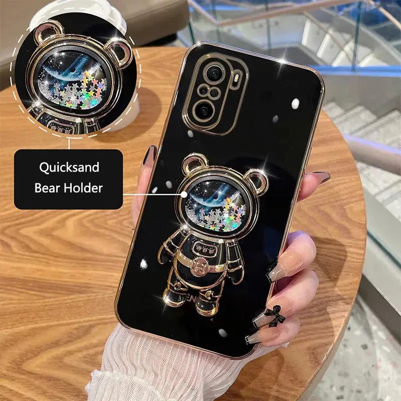 a person holding a phone with a watch on it