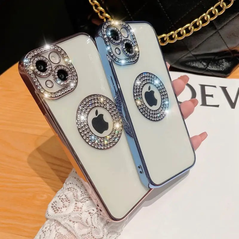 a woman holding a phone case with a diamond eye