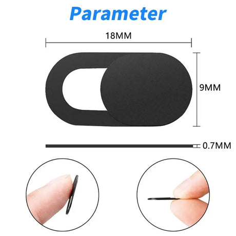 a black plastic circle with a small hole in the middle