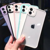 a hand holding four iphone cases
