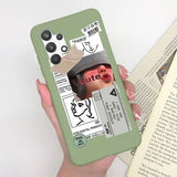 a person holding a book and a phone case