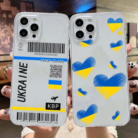 two people holding up their cell phones with a barcode on them