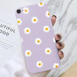 purple daisy iphone case with white daisies on it