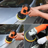 a close up of a person using a sander to polish a car
