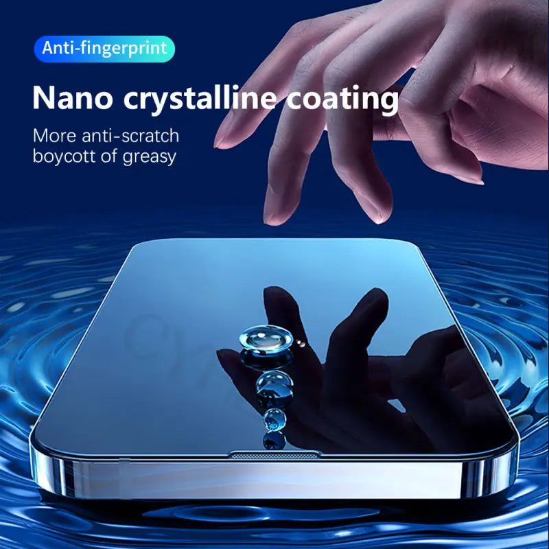 a hand touching a phone with water on it