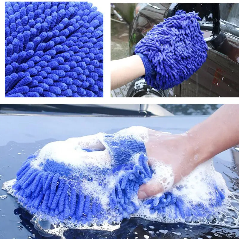 a close up of a person washing a car with a blue brush